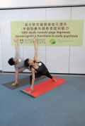 From the left: Yoga student Andy Lin and yoga teacher Kiki Lin are demonstrating step-16, the “side angle pose”.